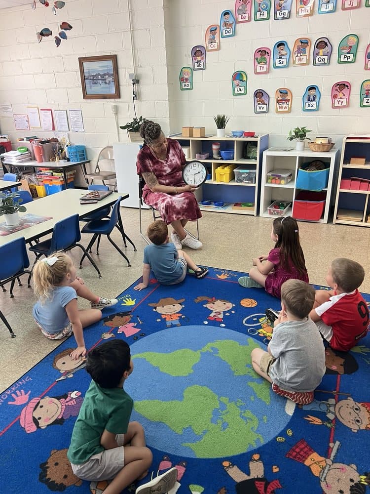 Children learning together at Our HoneyBee Academy